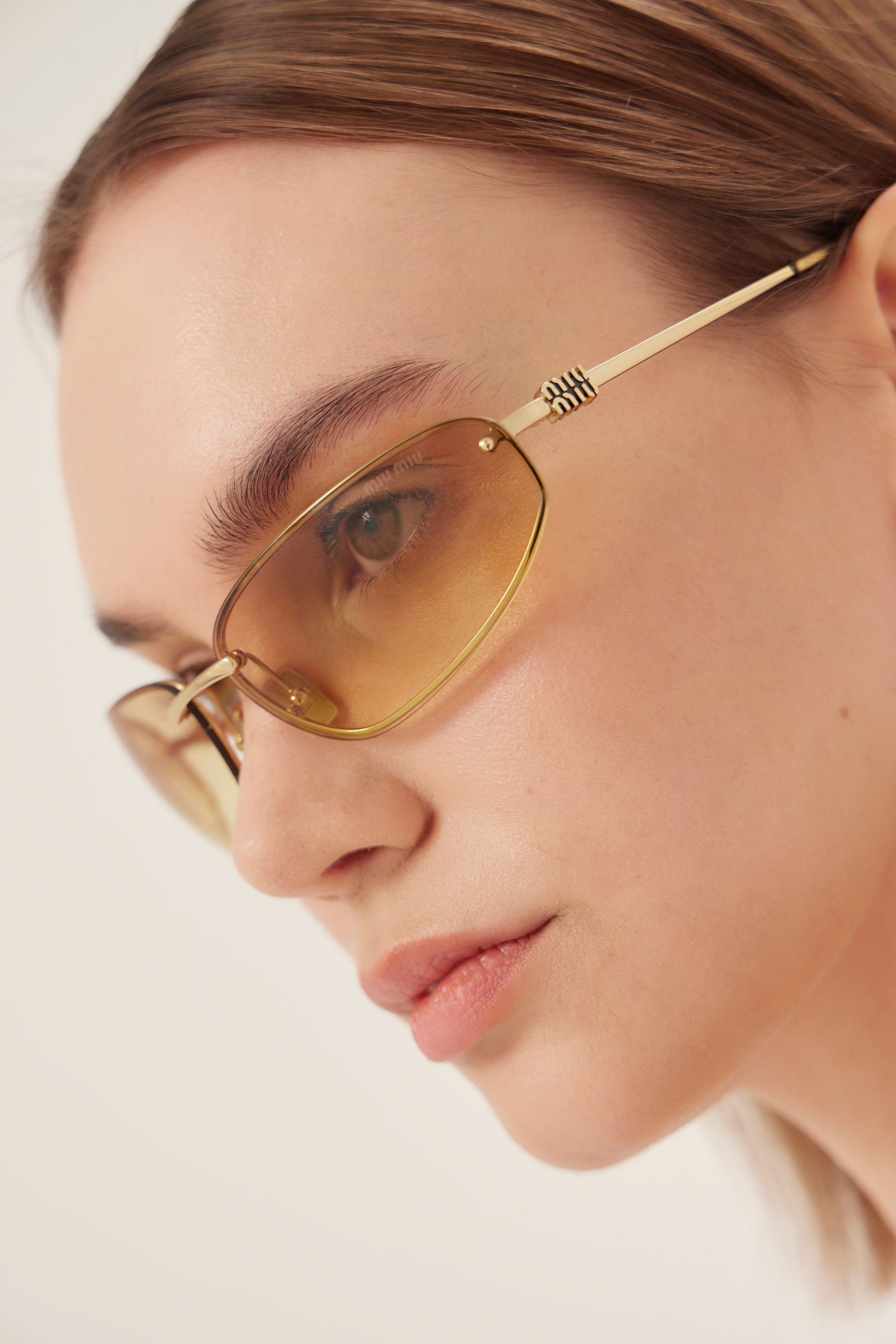 Miu Miu gold racing sunglasses 0MU A50S 5AK7R1